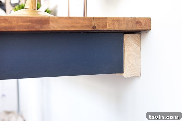 The Great Wall Desk Makeover: ORC Week 3 4 Close-up of newly installed wall-mounted desk from repurposed kitchen table