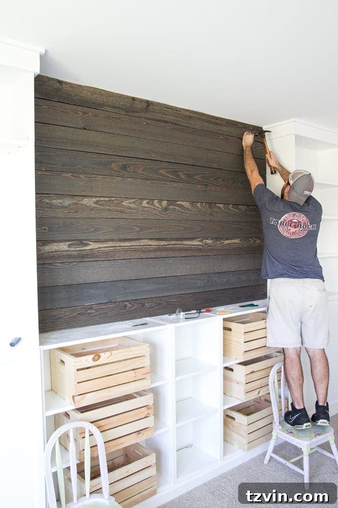 DIY Wood Plank Accent Wall - One Room Challenge Week 4 7 Nailing Wood Planks