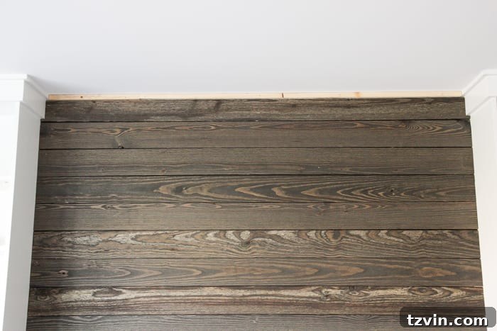 DIY Wood Plank Accent Wall - One Room Challenge Week 4 8 Cutting around Trim