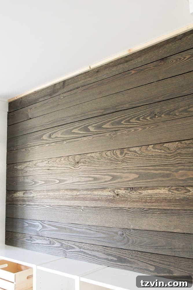 DIY Wood Plank Accent Wall - One Room Challenge Week 4 9 Adding Trim to the Top
