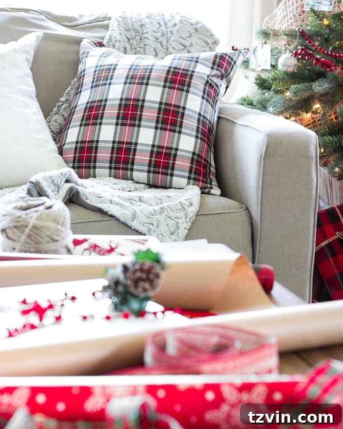 Cozy sofa with a plaid pillow and a gray faux fur throw, creating an inviting spot for relaxation.