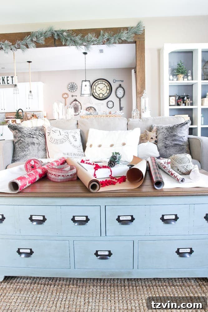 Cozy Christmas living room with a comfortable sofa, festive pillows, and a rustic coffee table, ready for holiday relaxation.