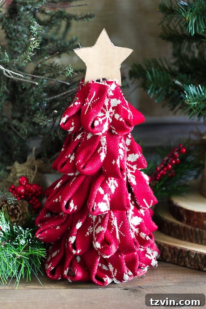 Charming Nordic Knit Mini Christmas Trees 13 DIY Nordic Sweater Mini Christmas Trees | blesserhouse.com - How to make Nordic sweater mini Christmas trees using just florist foam, ribbon, and hot glue for cute decor accents on tabletops and mantels.