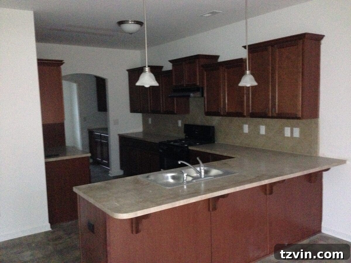 Dark Builder Grade Kitchen Before DIY Makeover