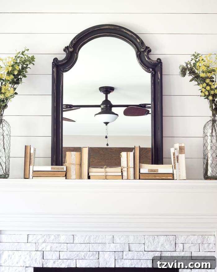 Distressed Charcoal Scroll Mirror Makeover using a simple distressing technique, a popular decor DIY.