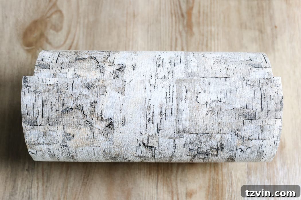Rustic Birch Bark Floral Vessel 6 Rolling the oatmeal can with birch bark paper