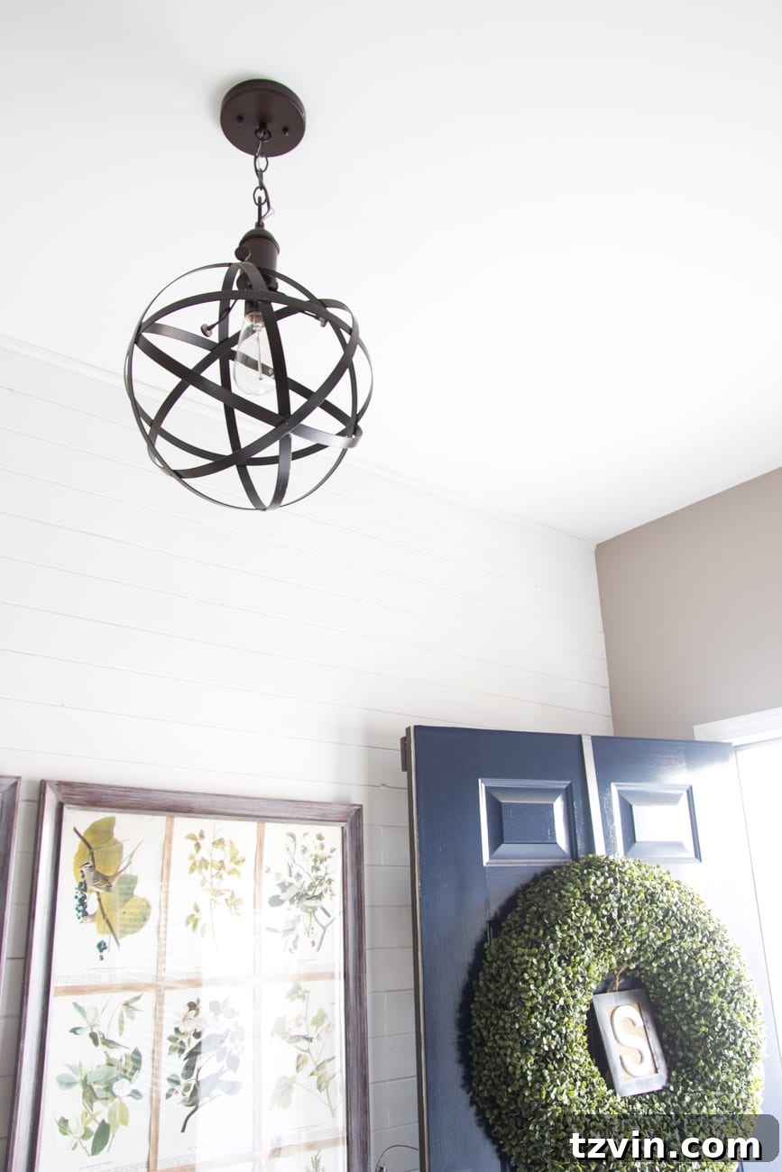 Your Blueprint for a Lightning-Fast Home Sale 21 A bright pendant light illuminating a room, demonstrating the effect of good lighting.