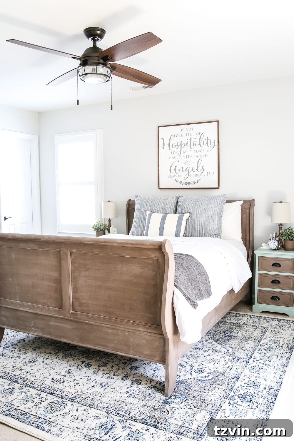 Serene blue cottage style guest bedroom after makeover
