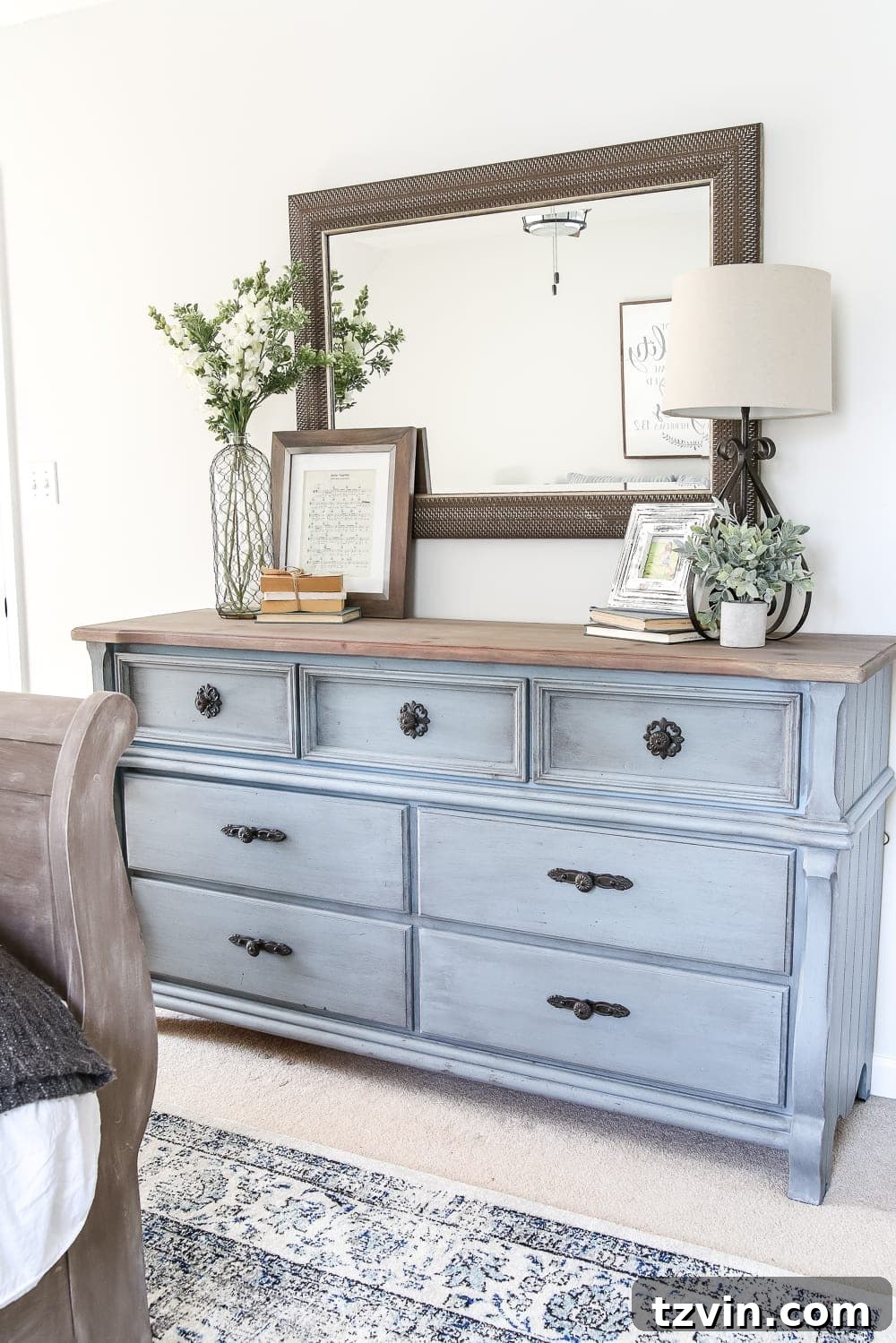 Guest bedroom after with a welcoming bed and nightstand