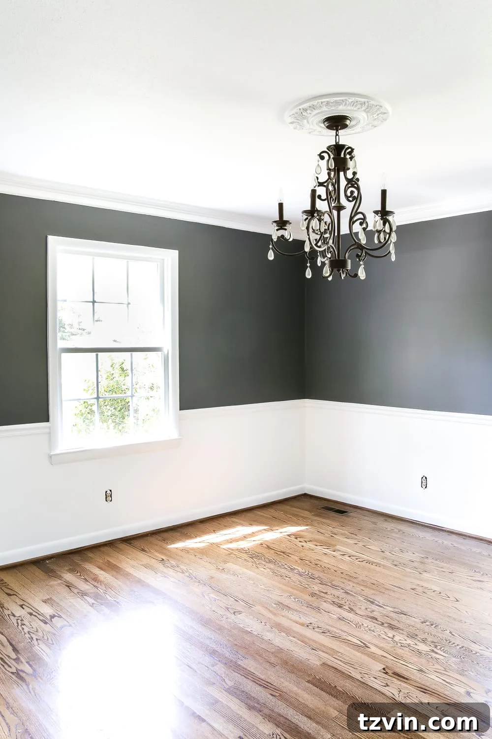 High Contrast Dining Room Reveal | blesserhouse.com - A beautifully painted dining room with Benjamin Moore Simply White and Kendall Charcoal, awaiting its final decor to complete the elegant look.