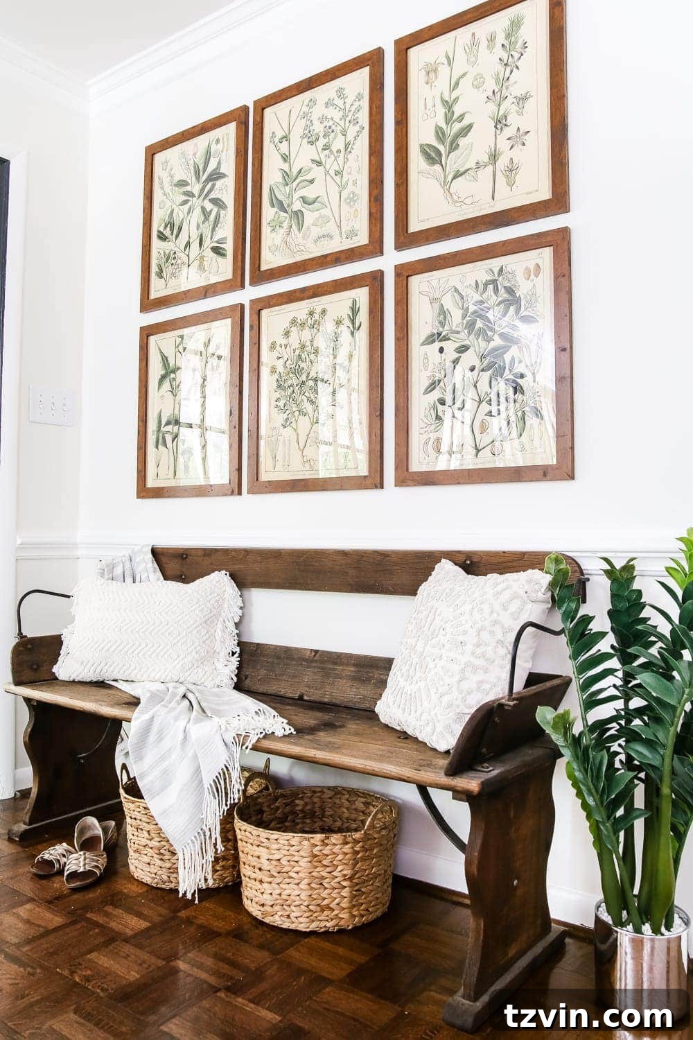 Elevate Your Walls with Printable Botany Art and a Clever Hanging Hack 9 A charming vignette featuring botany printable art, a vintage wagon bench, and practical storage.