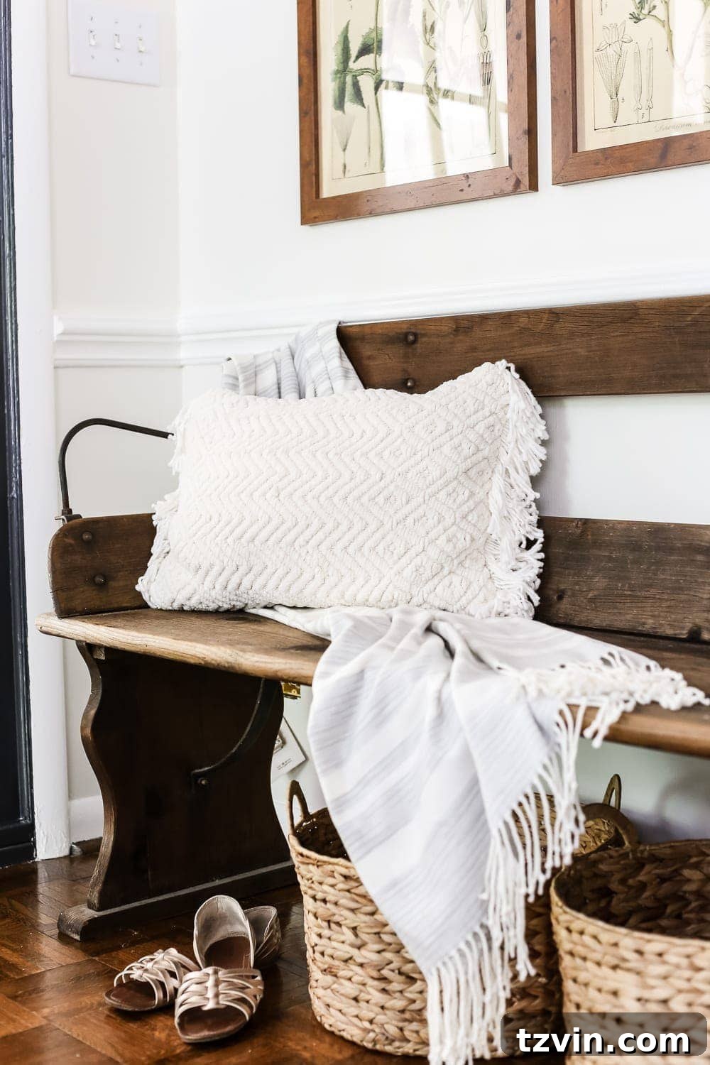 Elevate Your Walls with Printable Botany Art and a Clever Hanging Hack 10 Botanical art gallery wall above a vintage wagon bench, creating a functional and stylish entryway.