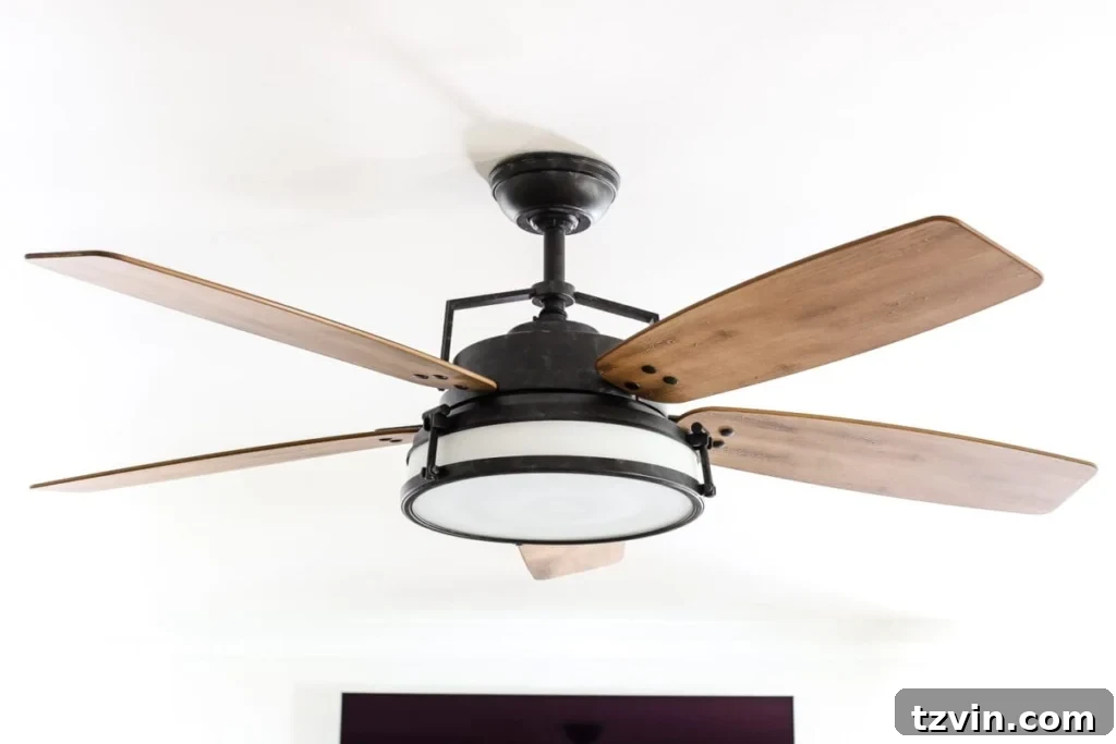 Living Room Refresh A Stylish Spin 2 Modern industrial farmhouse style Casablanca Caneel Bay ceiling fan in a newly renovated living room, showing its elegant design and how it complements the space.