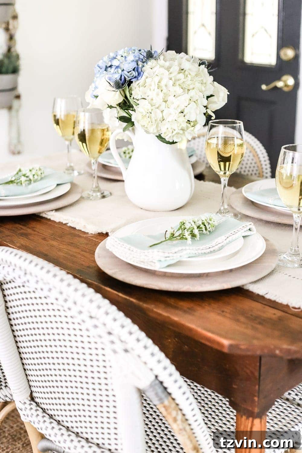 A Modern French Farmhouse Summer Retreat 6 French Bistro Chairs in Modern Farmhouse Breakfast Nook - A summer home tour featuring modern French farmhouse style, inexpensive decorating tricks, and ways to make your home look luxurious on a budget.