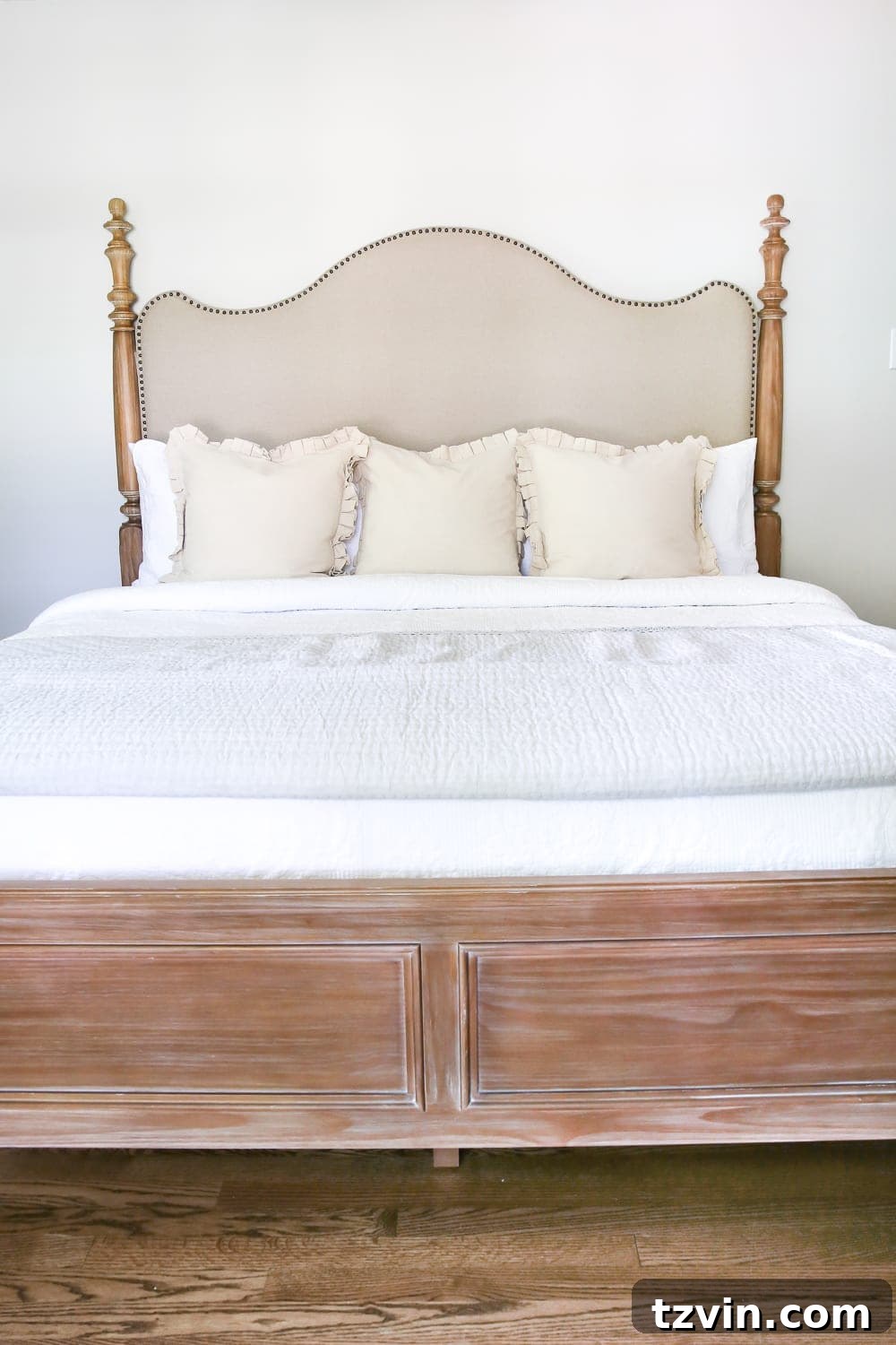 Coastal Charm with Pickled Pine Furniture in the Master Retreat 5 Master Bedroom Update: Pickled Pine Furniture | blesserhouse.com - A detailed shot of the pickled pine bed, showcasing its unique finish and elegant design.