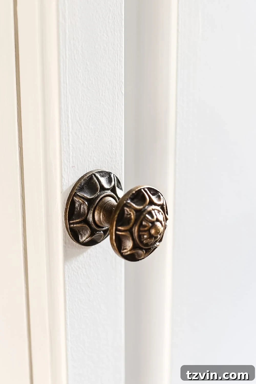 Laundry Room Updates: French Bifold Door | blesserhouse.com - A rickity laundry room bifold door gets a beautiful and functional update with a French bifold door with frosted glass for hiding messes in a stylish way.