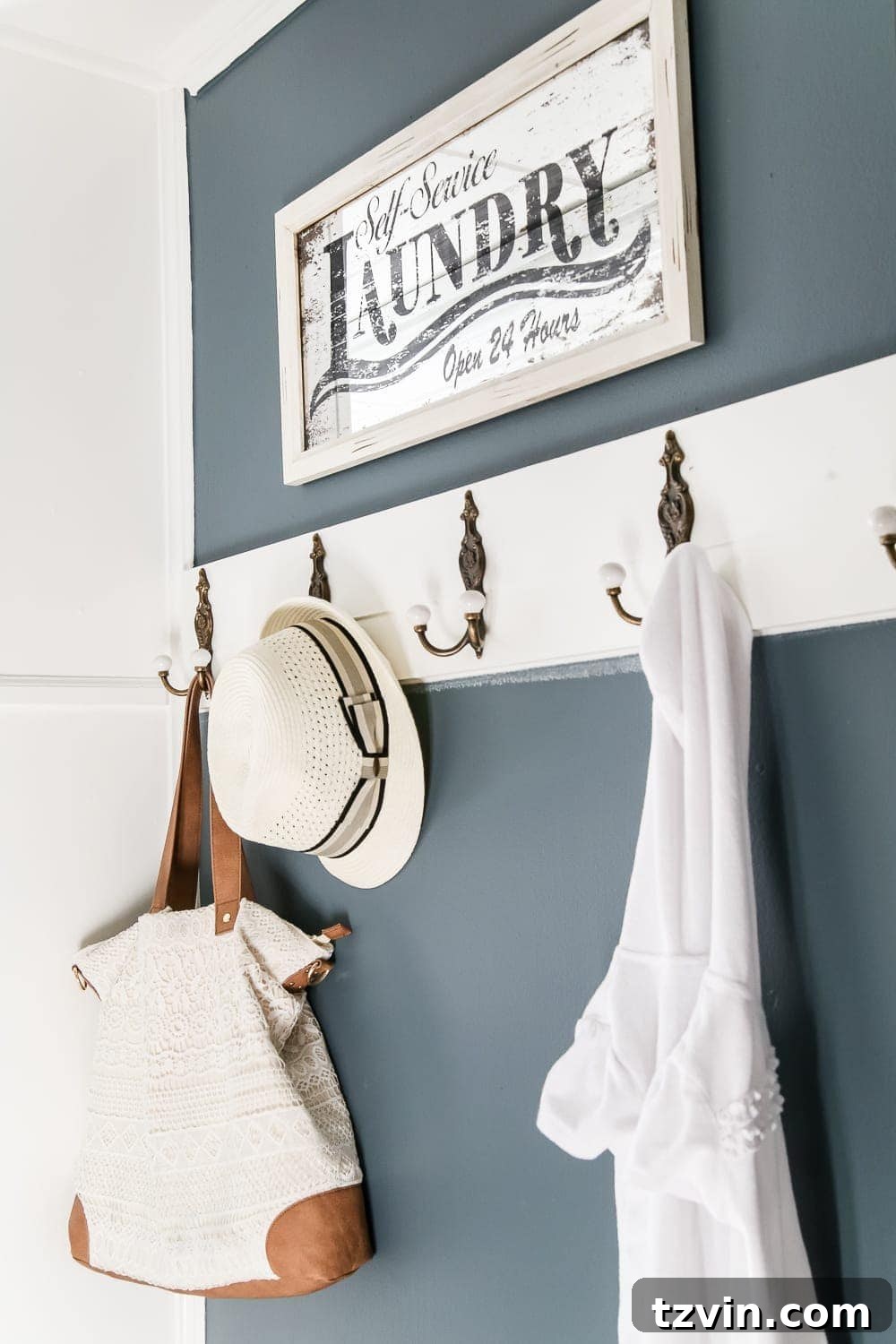 Laundry Room Updates: French Bifold Door | blesserhouse.com - A rickity laundry room bifold door gets a beautiful and functional update with a French bifold door with frosted glass for hiding messes in a stylish way.