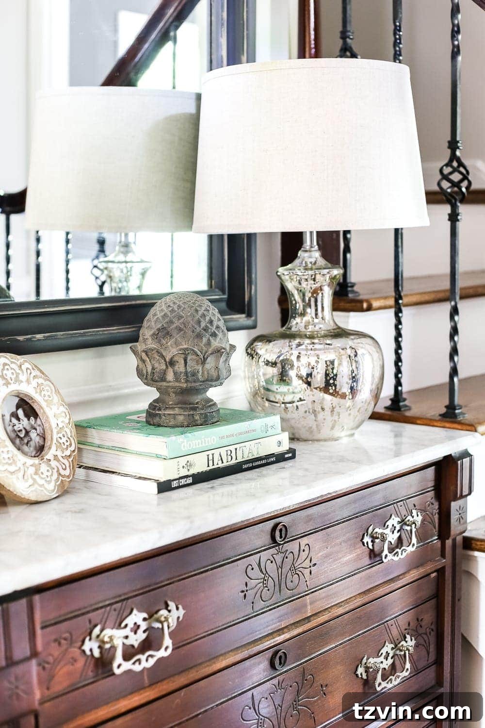 Styled Foyer Entryway with Lamp and Greenery