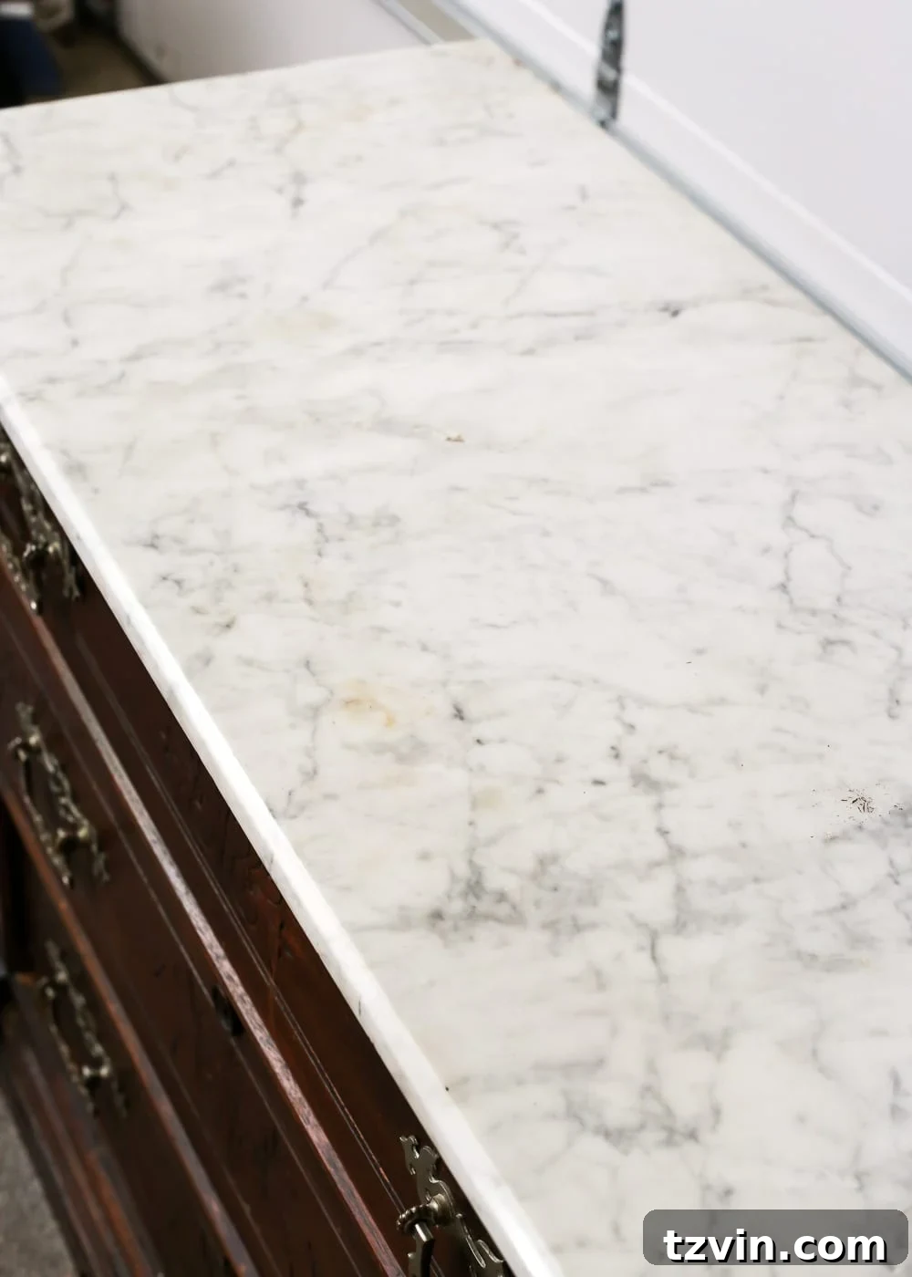 Close-up of Stained White Marble Top Before Cleaning