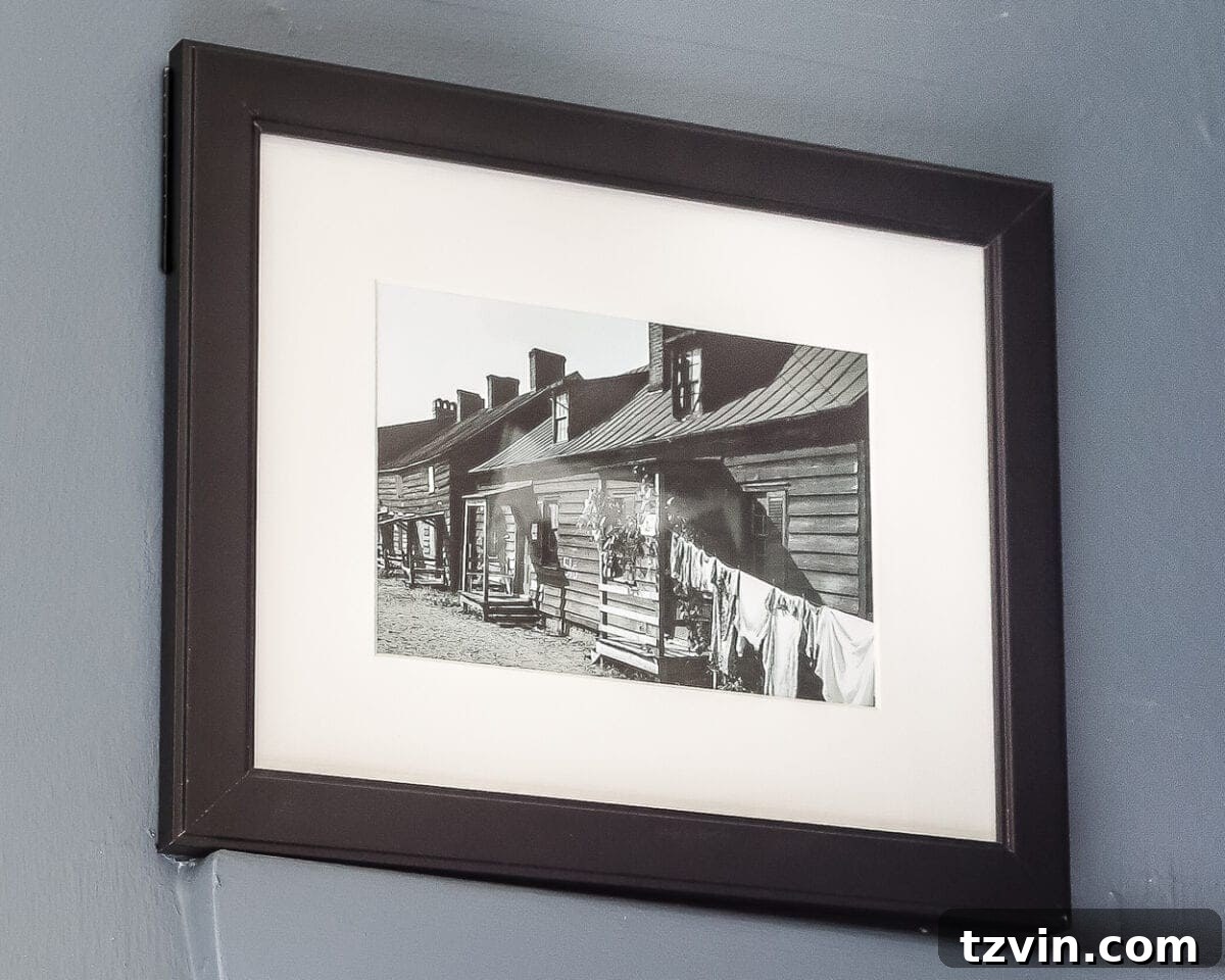 Charming Vintage Laundry Day Art Prints 9 Vintage Clothesline Laundry Room Art Printable Set | blesserhouse.com - A free downloadable printable set of 6 vintage black & white clothesline cityscape and countryscape photos perfect for framing in a laundry room.