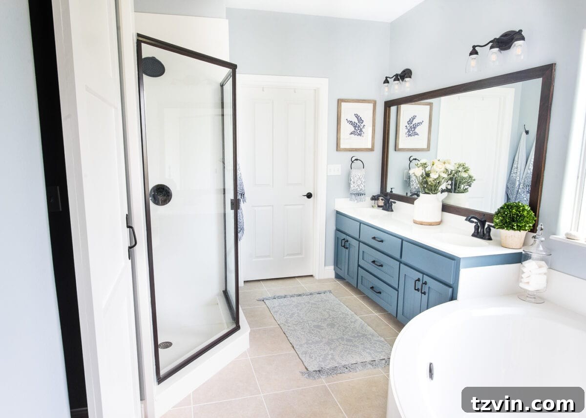 Lowes Bathroom Remodel Showcase 13 After: The transformed modern farmhouse bathroom with updated fixtures, colors, and textures, radiating calm.