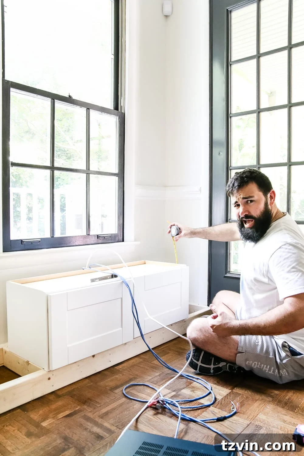 Kitchen Cabinet Window Seat Transformation 5 DIY Window Seat from a Kitchen Cabinet | blesserhouse.com - A simplified tutorial for how to build a DIY window seat using a prefabbed kitchen cabinet to house electronics and hide cords.