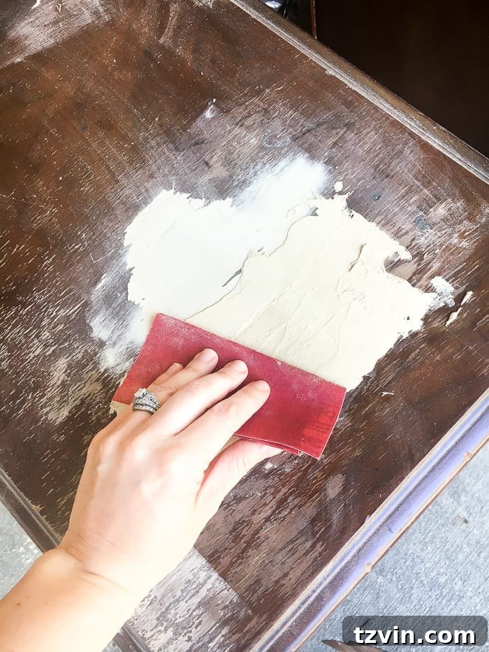 Revive Your Furniture: The Easy Paint Transformation 11 patching holes in furniture veneer with wood filler