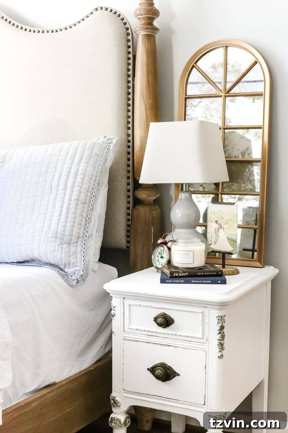 The finished mirror on a bedside table