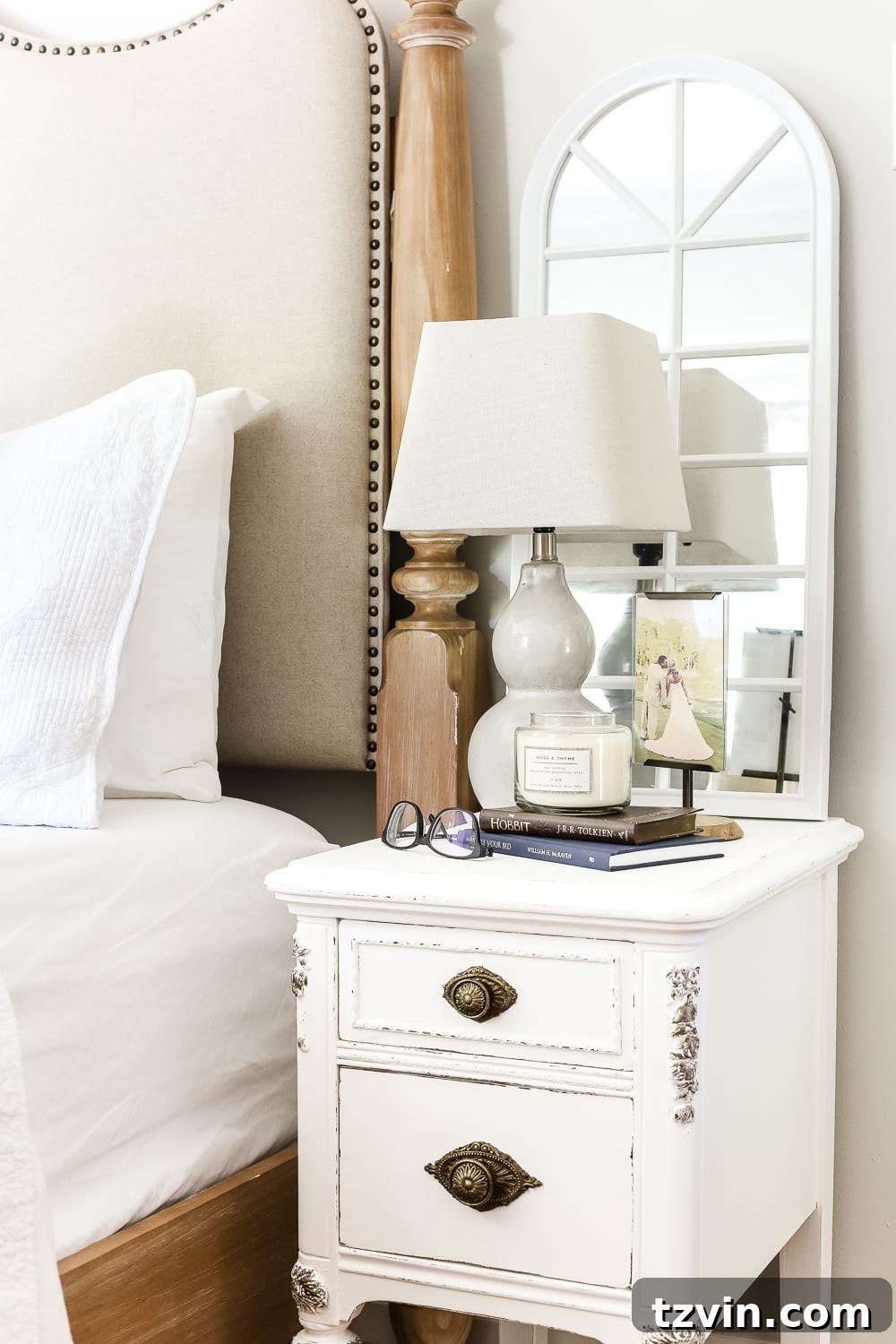 The finished mirror on a bedside table