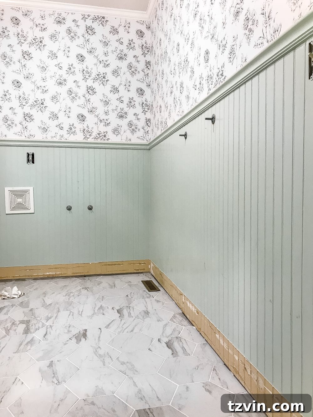 Powder Room Radiance: Faux Marble Tile Floor Upgrade 9 Another view of the newly installed faux marble hexagon tile floor in the powder room, showcasing its bright and clean aesthetic, transforming the space into a modern classic.