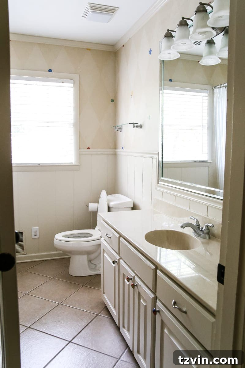 Teal Painted Bathroom Glow Up 2 Teal Painted Bathroom Makeover | blesserhouse.com - A boring, dated beige bathroom gets a fresh teal painted makeover with Magnolia Home Paint in the color Weekend and Ben Moore Simply White and Wrought Iron.