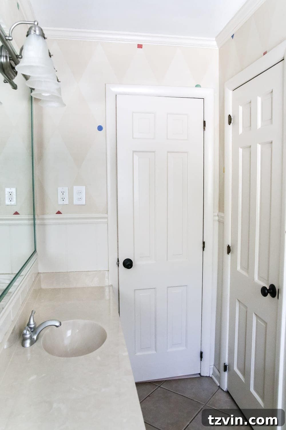Teal Painted Bathroom Glow Up 6 Teal Painted Bathroom Makeover | blesserhouse.com - A boring, dated beige bathroom gets a fresh teal painted makeover with Magnolia Home Paint in the color Weekend and Ben Moore Simply White and Wrought Iron.