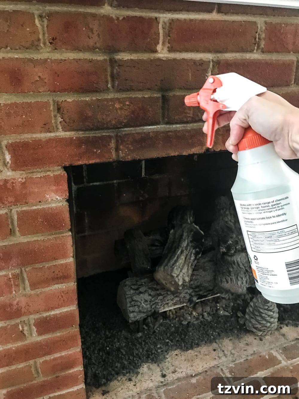 spray sooty dirty bricks with vinegar to clean