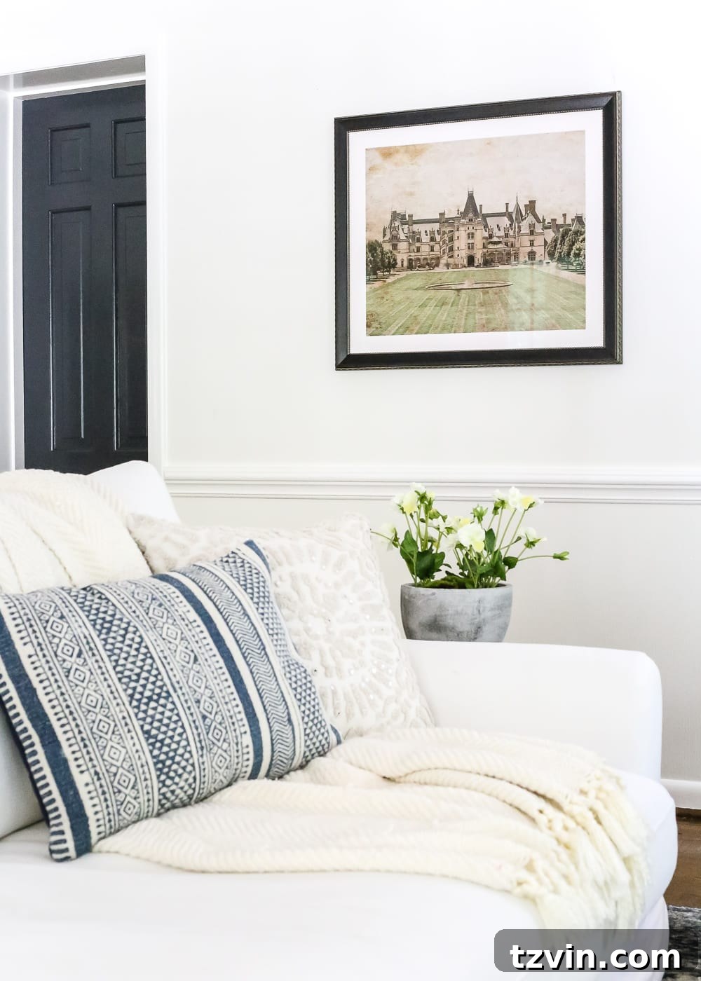 Final view of living room with Biltmore art hung using High & Mighty hooks, offering an elegant solution for difficult walls.