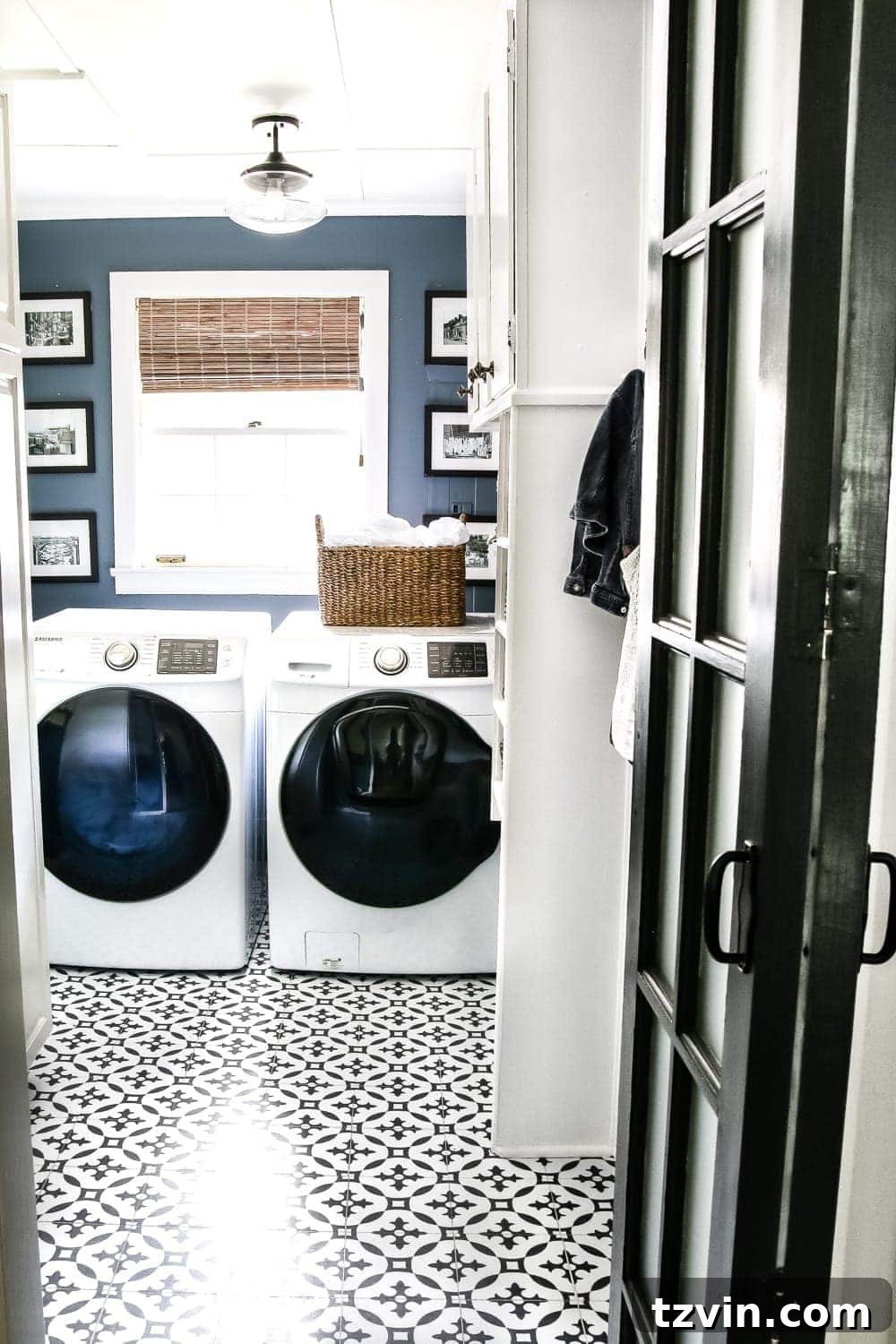 Bold Contrast Laundry Room Transformation 24 Completed high-contrast navy and white laundry room with new washer and dryer, organized shelving, and stylish decor.