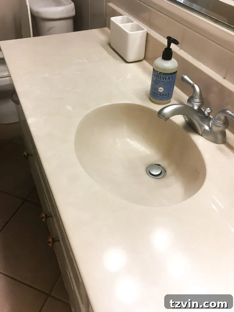 Transform Your Bathroom Counter with Paint 3 Outdated beige cultured marble bathroom sink and countertop before painting