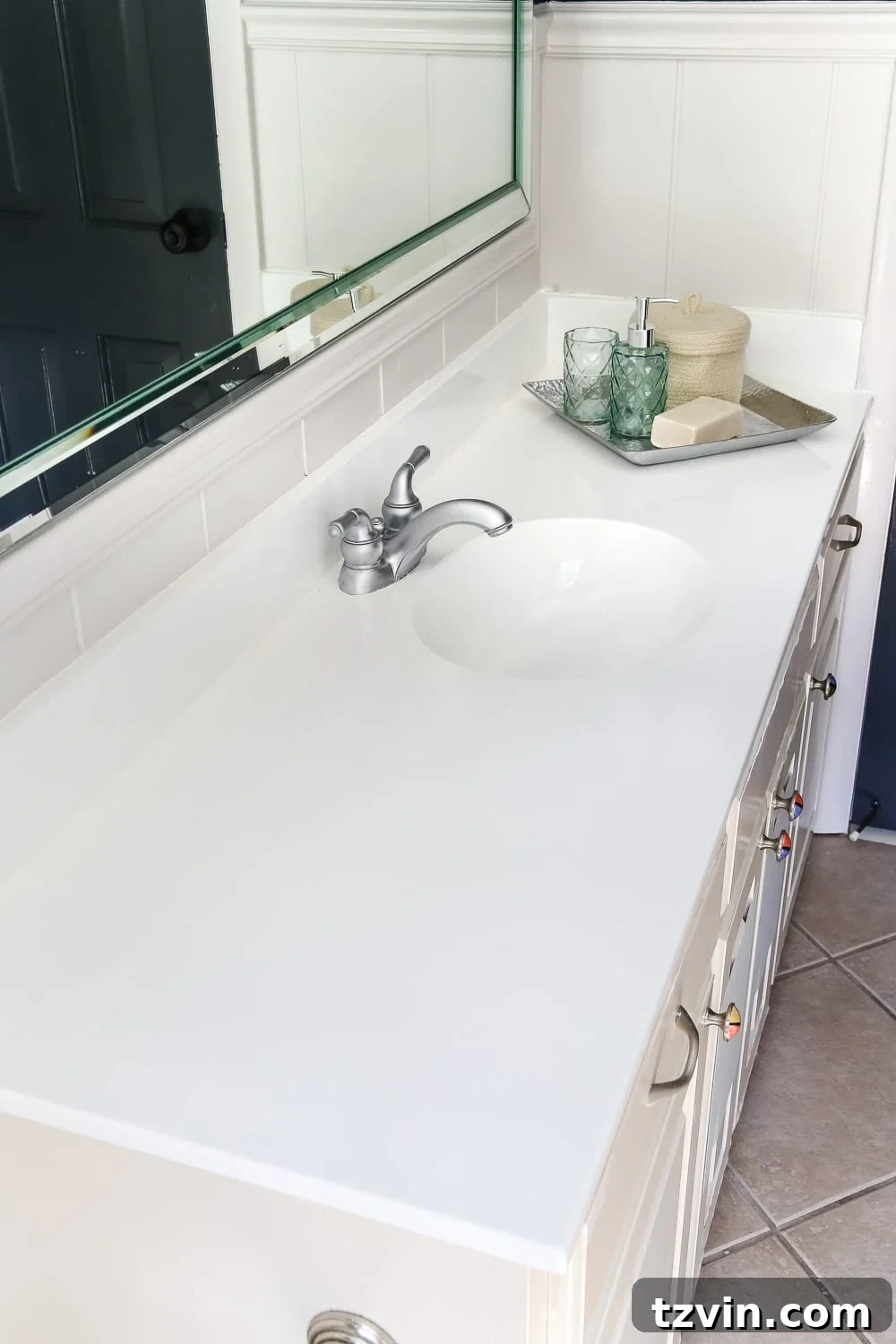 Transform Your Bathroom Counter with Paint 22 painting an old countertop white with Rustoleum tub and tile refinishing kit