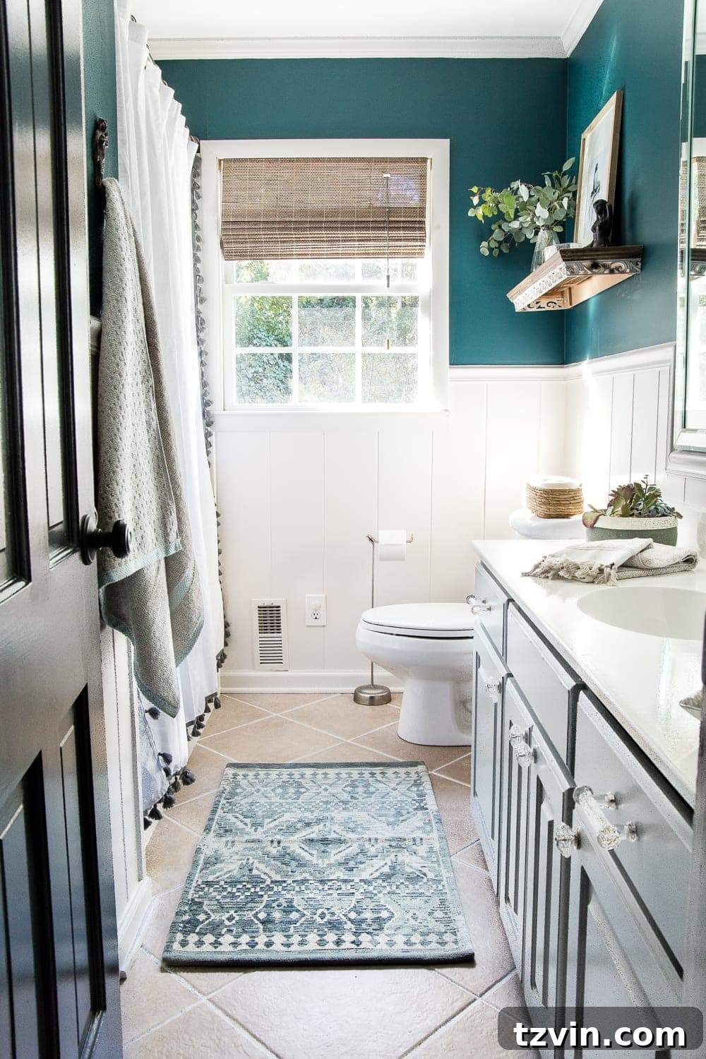 Transform Your Bathroom Counter with Paint 25 guest bathroom after makeover with teal walls and white painted fixtures