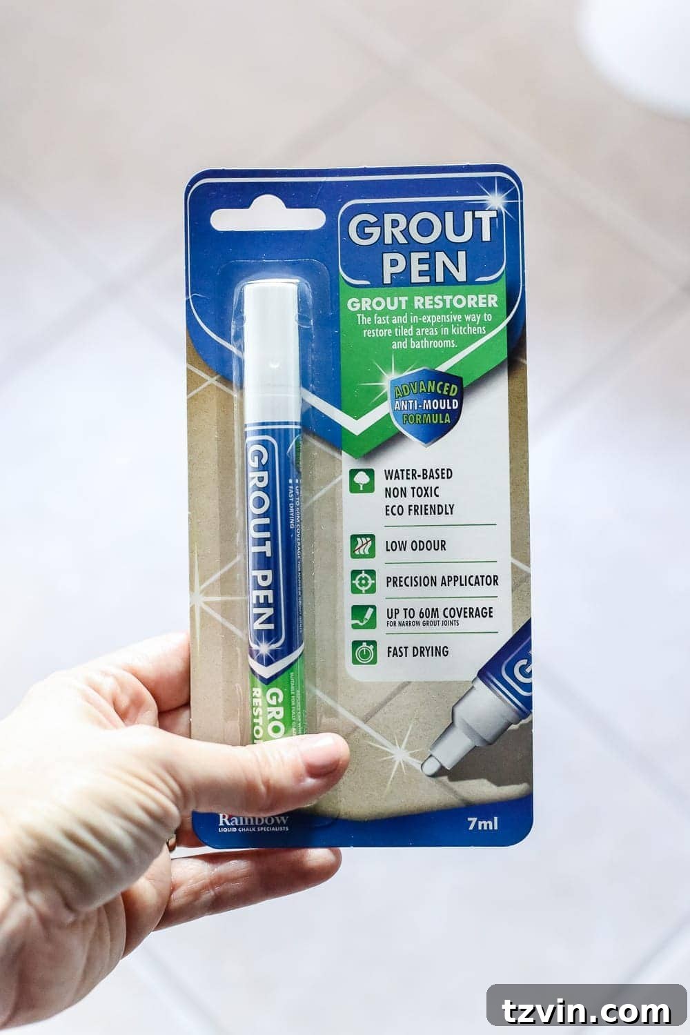 Renewing Painted Tile Grout 6 Applying Grout Pen to Refresh Bathroom Tile Grout - DIY tutorial for brighter floors.