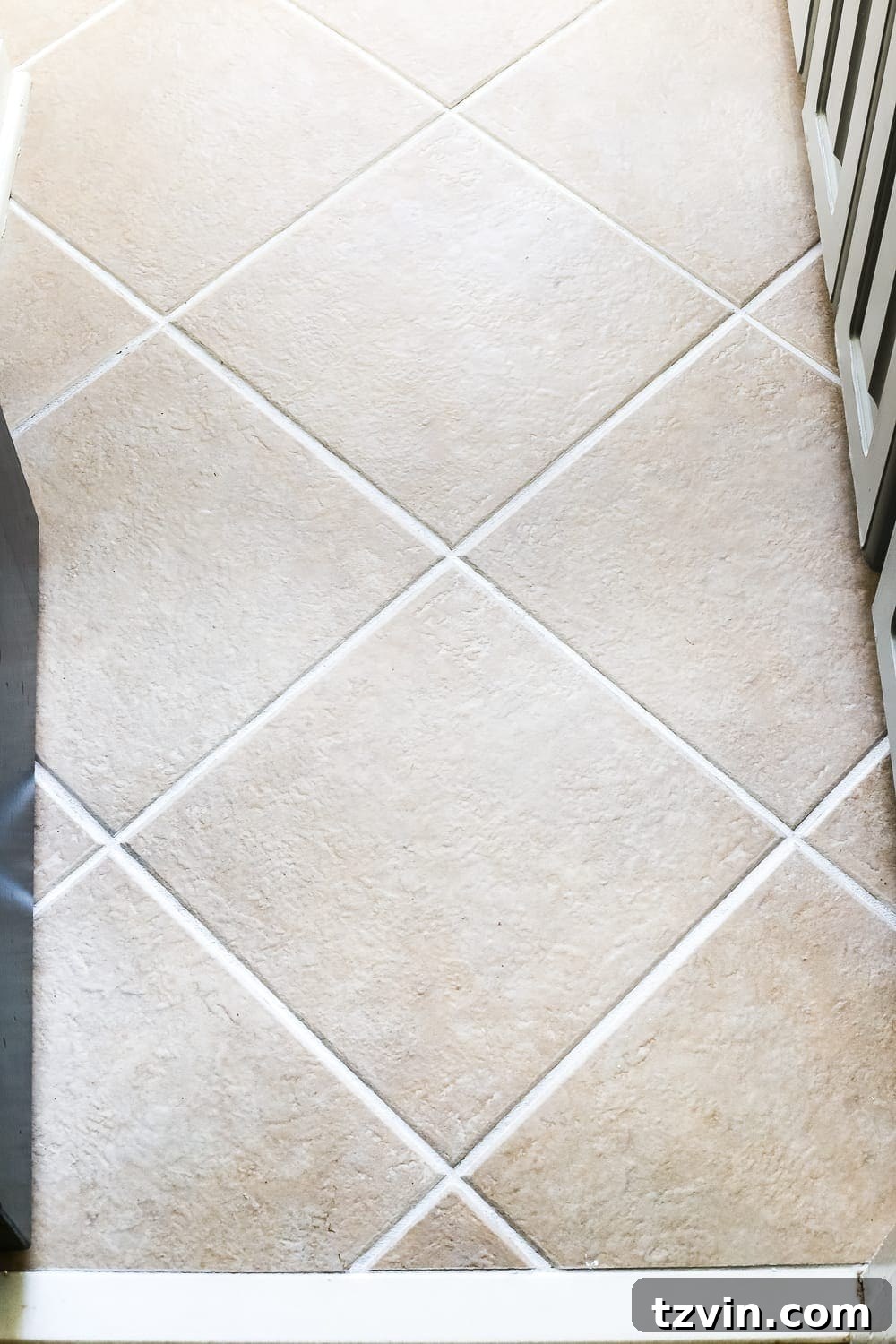 Renewing Painted Tile Grout 8 Bright and Clean Bathroom Floor Grout After Refresh - Before and after DIY comparison.