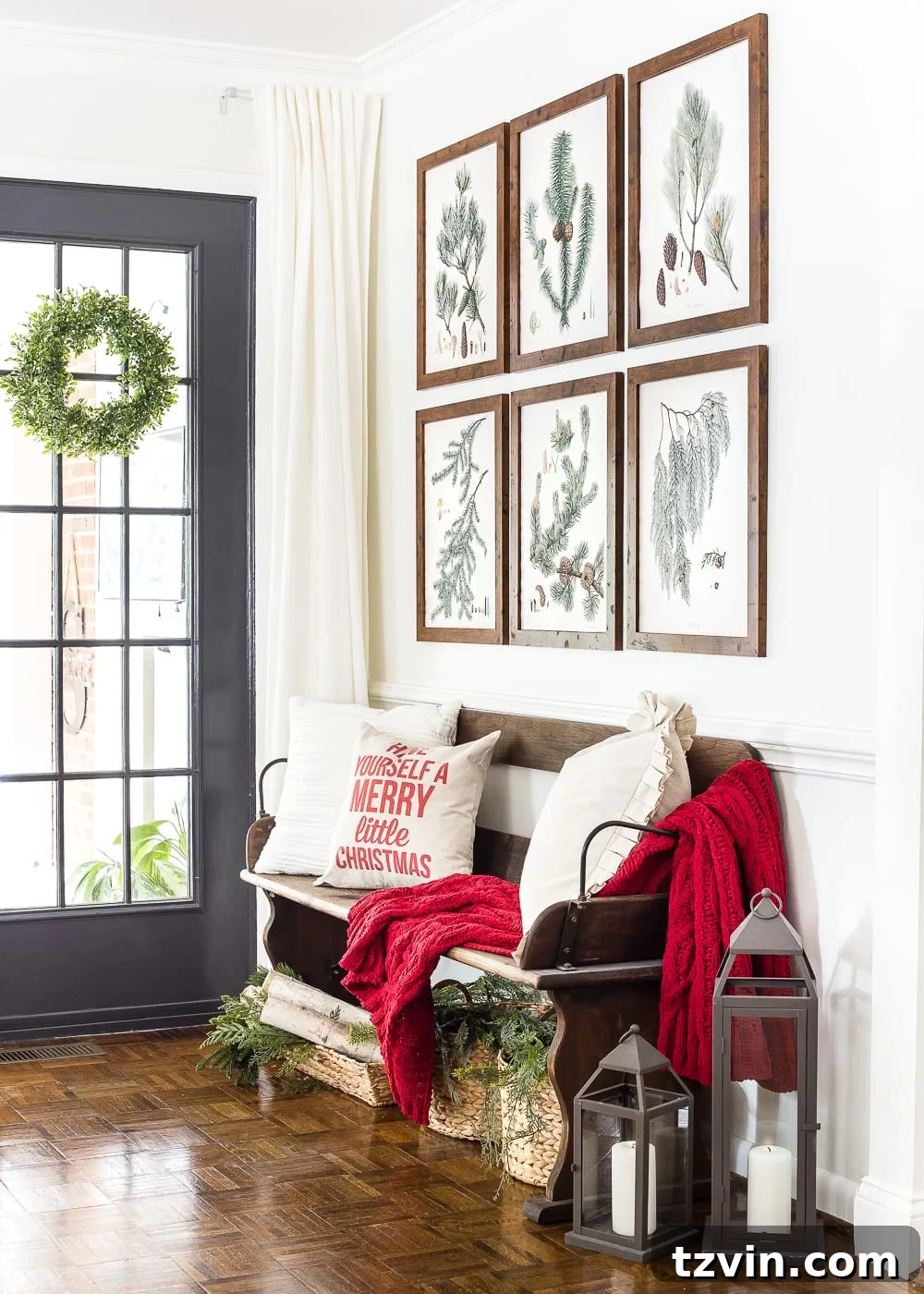 Winter Botanical Printable Wall Art Set 2 Elegant Christmas entryway bench decorated with free evergreen botanical prints framed on a gallery wall