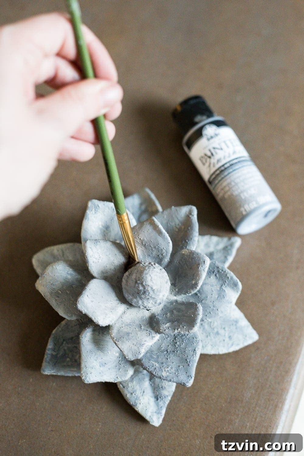 Painting to Mimic Concrete 5 Applying the light-colored base coat