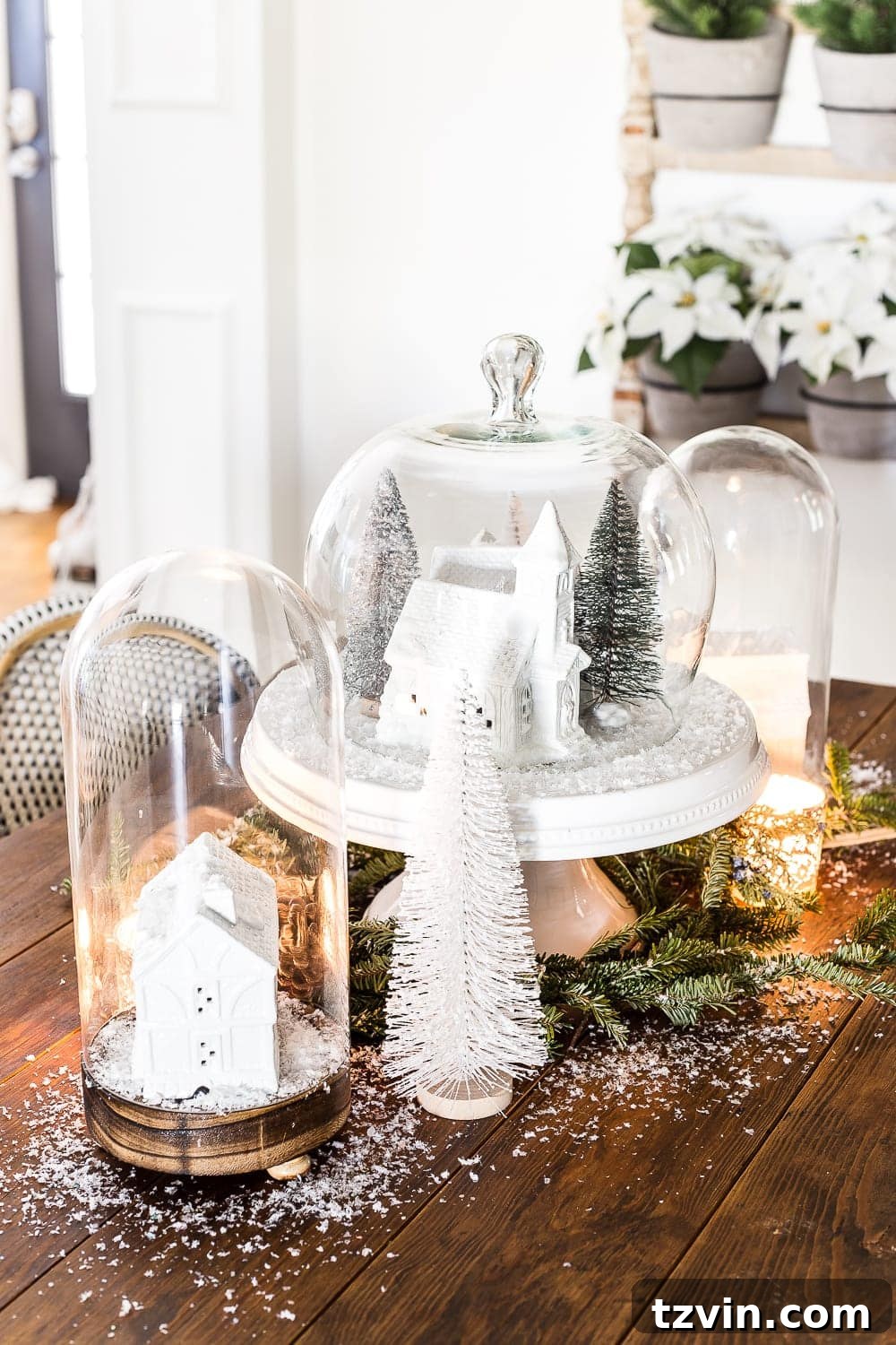 A beautiful close-up of a DIY Christmas snow globe centerpiece, highlighting its handcrafted charm and festive details.
