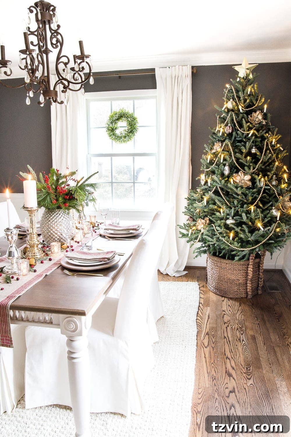 dining room with decorated real Christmas tree