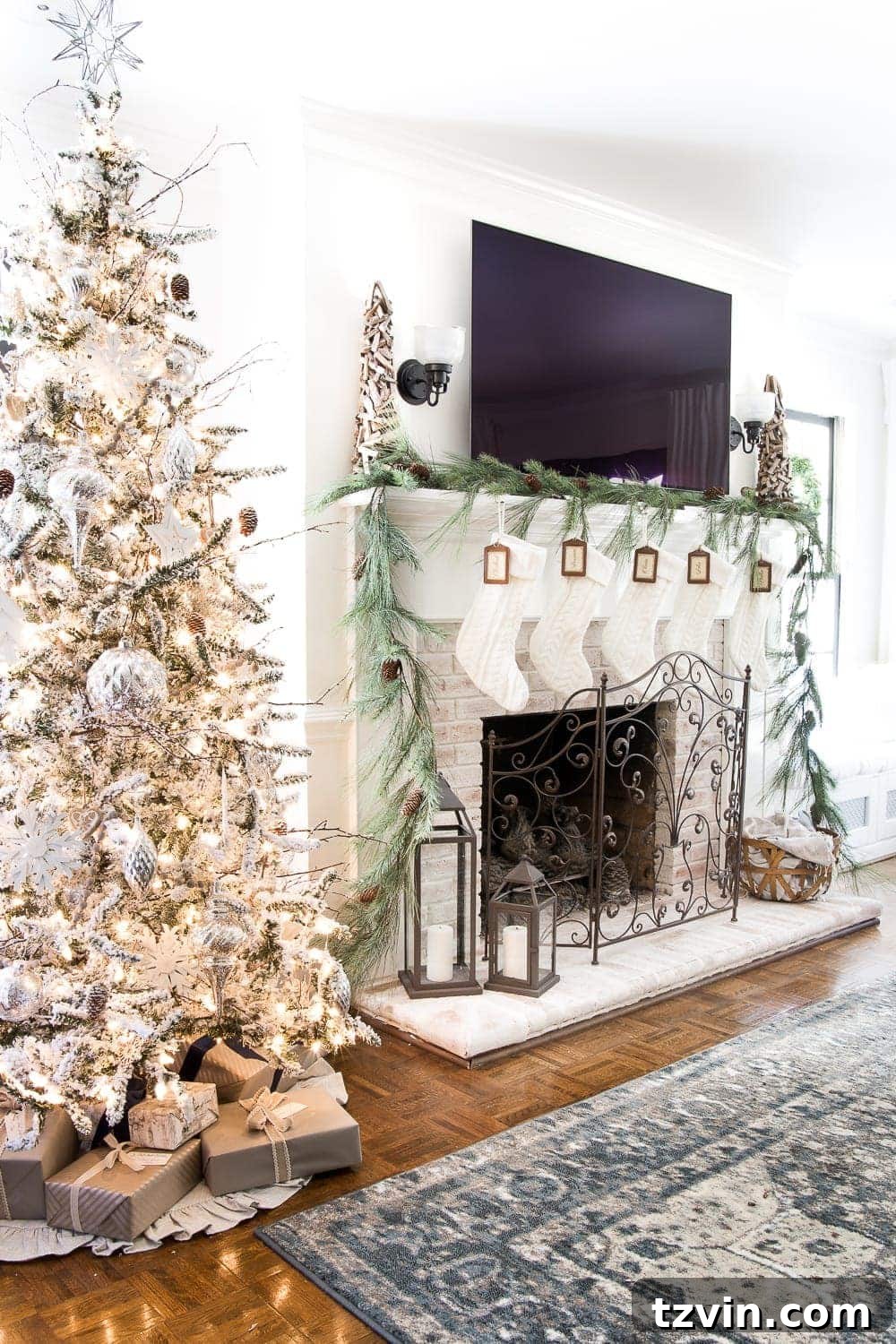 Warm and inviting neutral Christmas living room featuring a fireplace, minimalist mantel decor, and a cozy armchair.