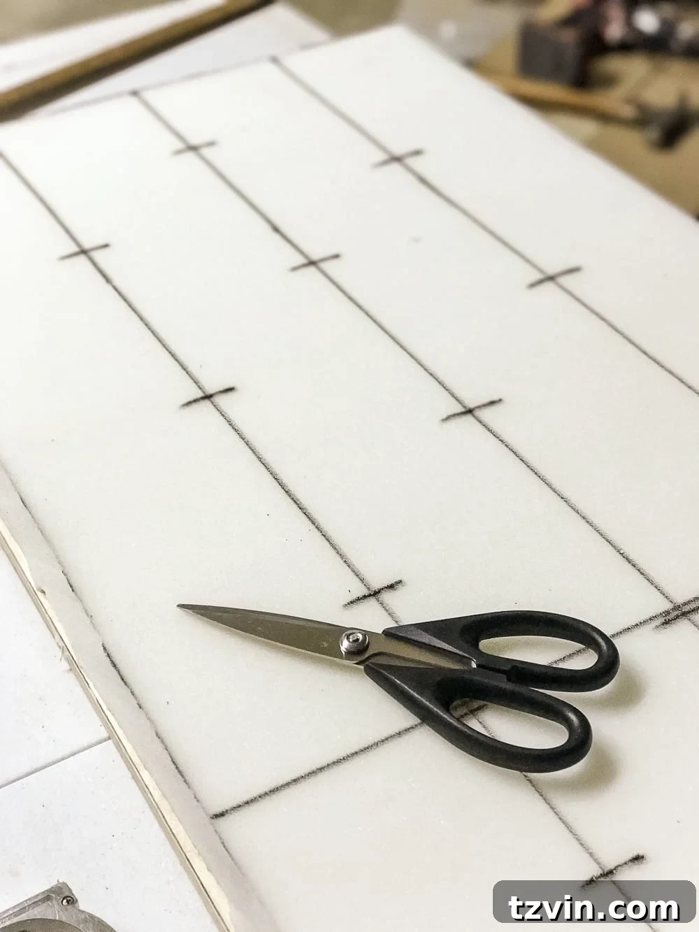 Detailed marking of button locations on the foam
