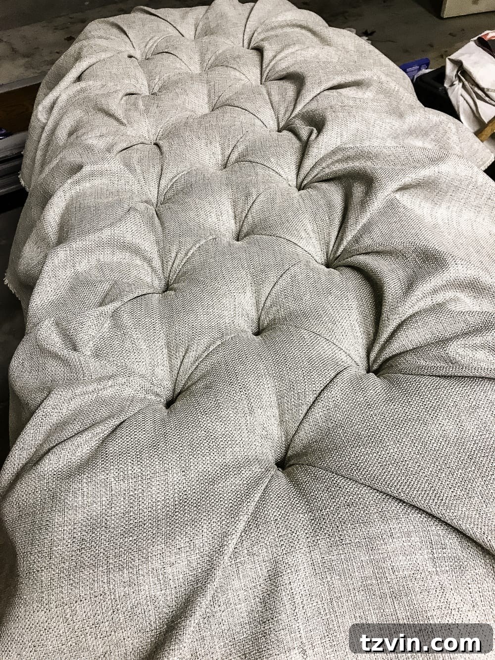 Creating diamond creases for the middle row of tufts