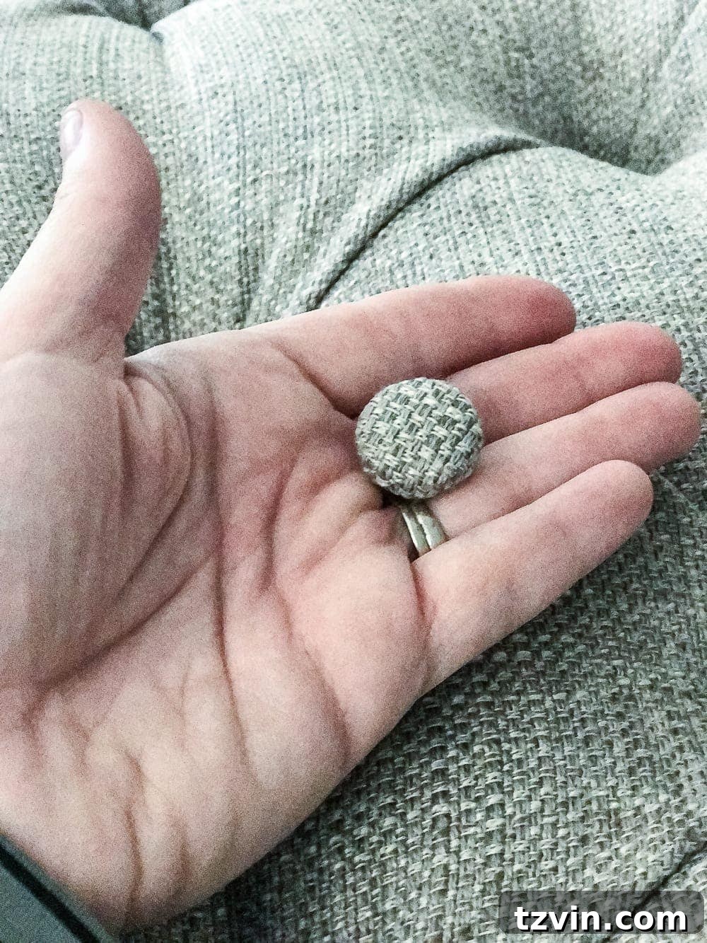 Securing fabric to button backs with hot glue due to fabric thickness