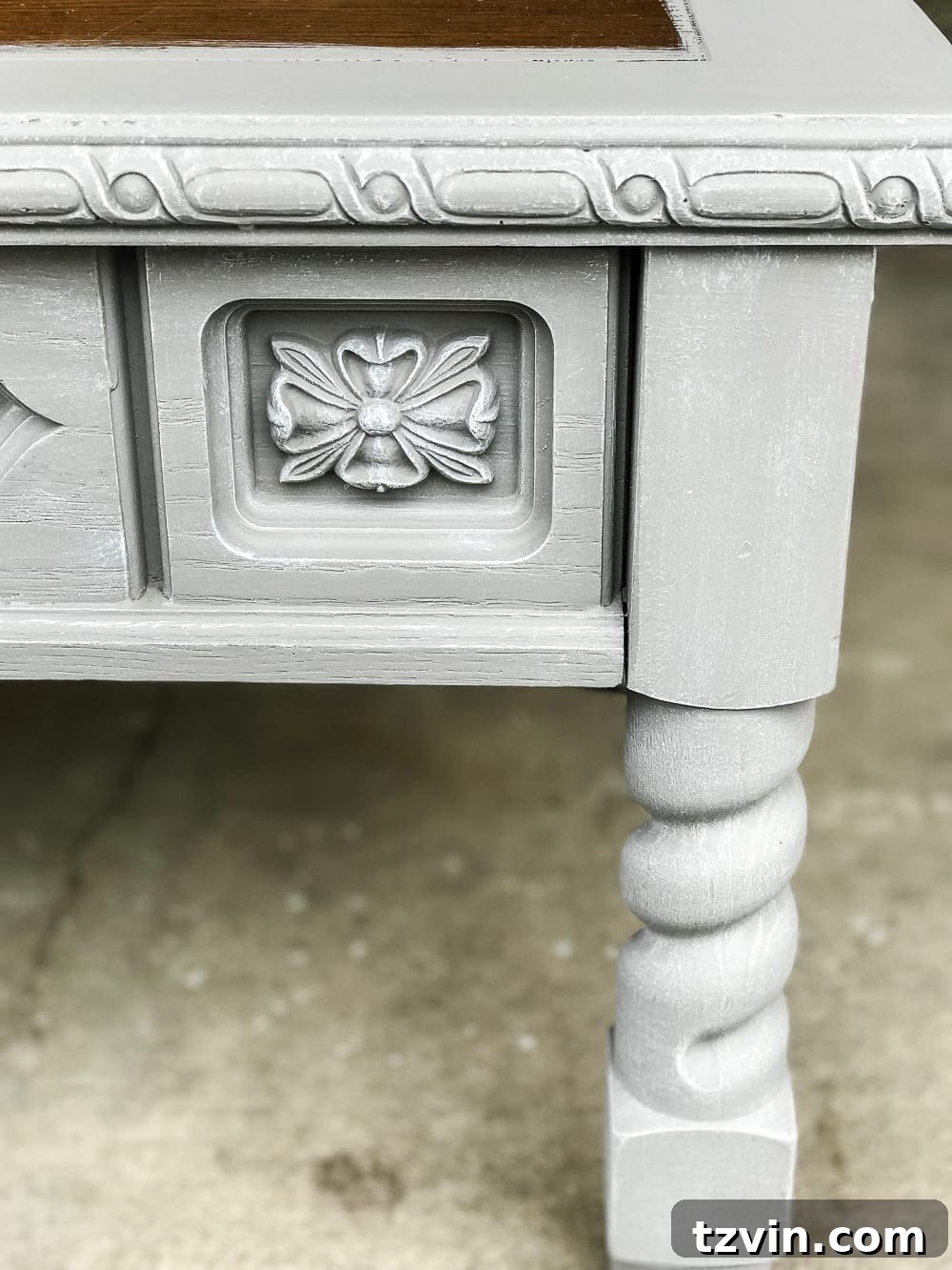Applying dry brush paint to enhance wood texture