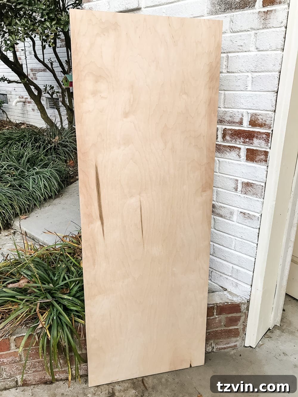 Applying dark wax to seal and antique the furniture base